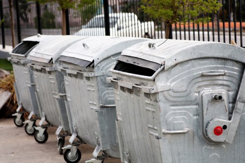 Business professionals managing waste removal